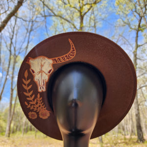 Brown country sun hat with hand painted steer animal skull and custom cow print band and belt with bullet studs