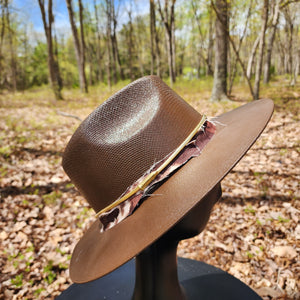 Brown country sun hat with hand painted steer animal skull and custom cow print band and belt with bullet studs