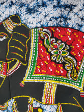 Blanket detail on Traditonal indian tapestry two black elephants with red and green blanket and yellow tusks. Blue tie dye background with black border. Mini poster sized tapeatry 30 x 40 inches from Freebird Revolution